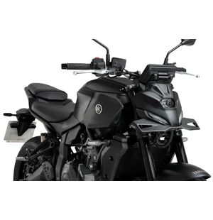 "Boost the aesthetics and sport character, as well as improving the aerodynamic aspect, of your motorcycle with the Naked front spoiler from Puig.<br><br>Designed in Barcelona with the most innovative technologies, the new Naked front spoiler is made of 3 kuva