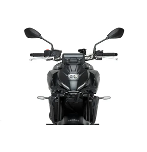 "Boost the aesthetics and sport character, as well as improving the aerodynamic aspect, of your motorcycle with the Naked front spoiler from Puig.<br><br>Designed in Barcelona with the most innovative technologies, the new Naked front spoiler is made of 3 kuva